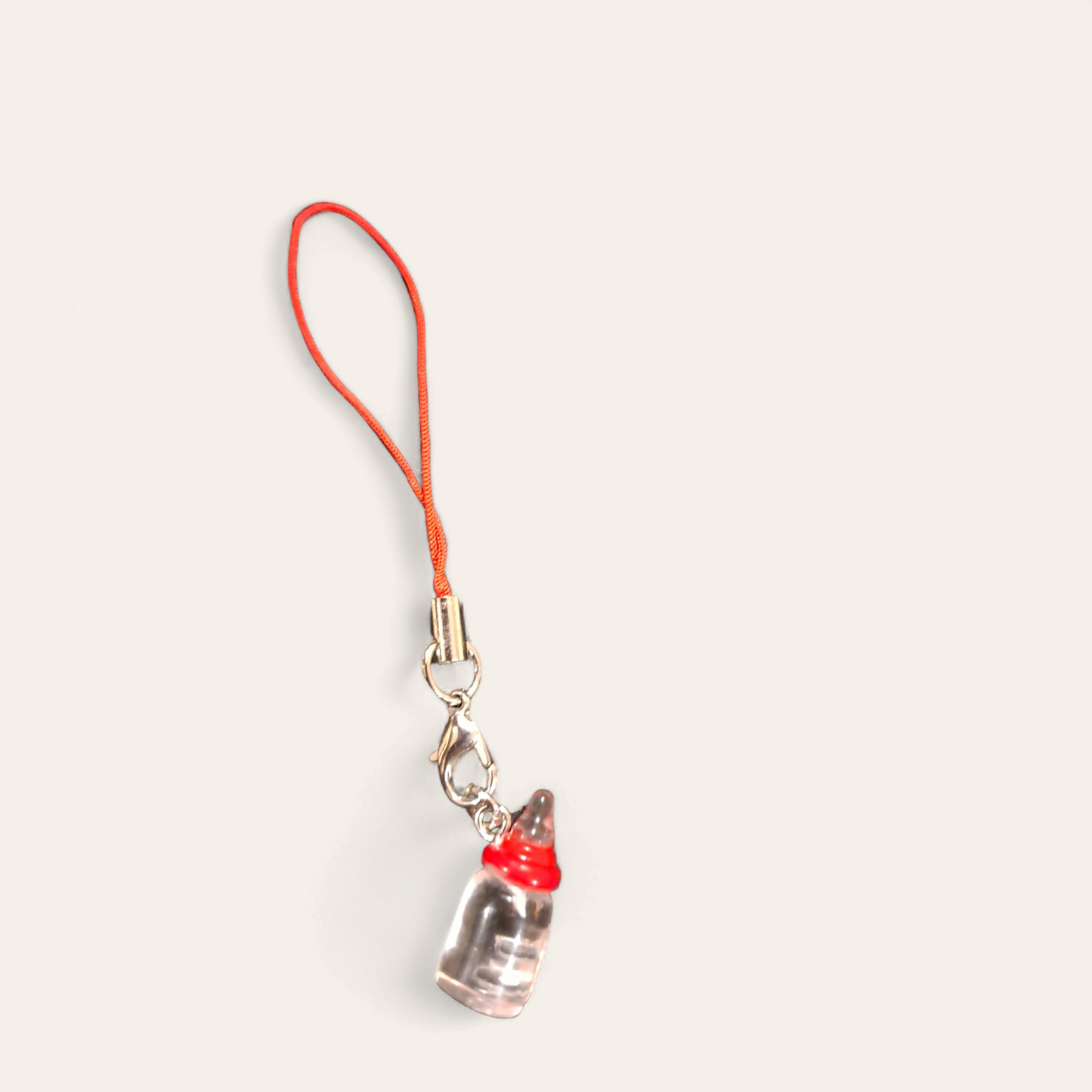 Cute baby bottles mobile phone charm, baby bottles strap, iPhone baby bottles charm strap.